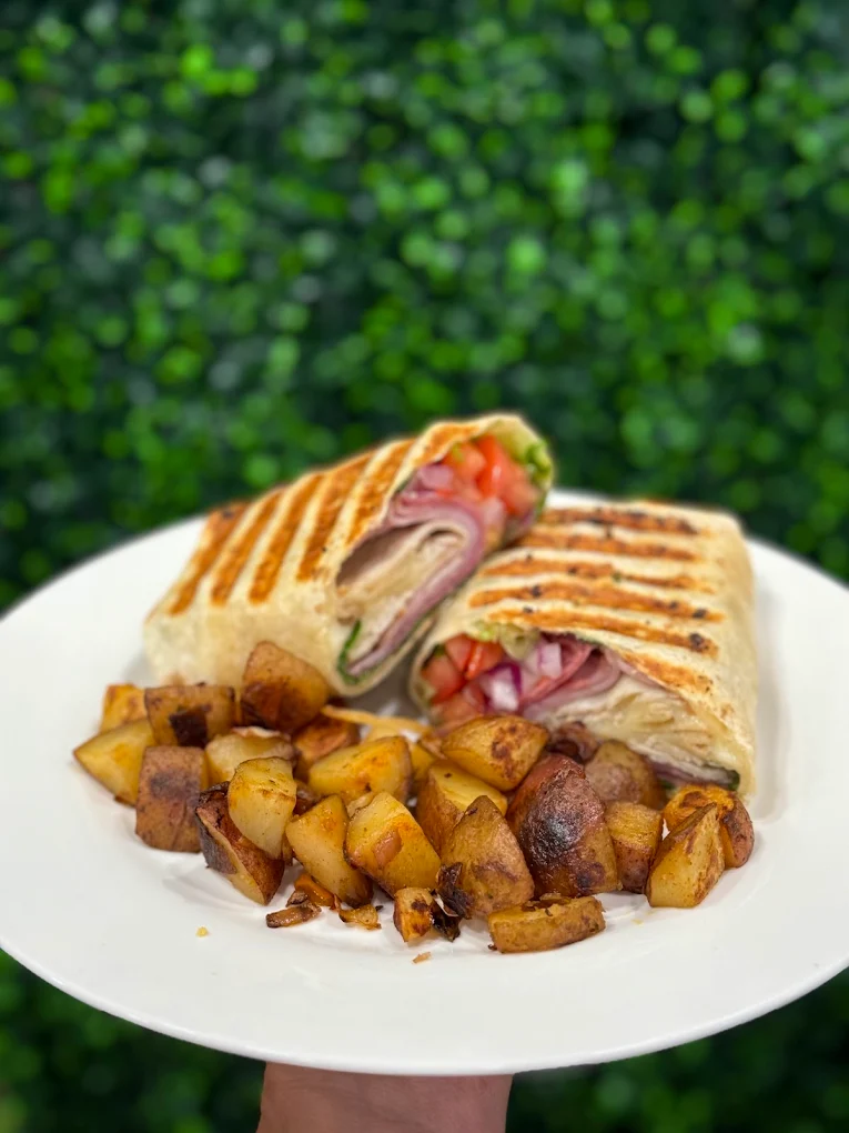 Fresh panini sandwich at Biscotti's Cafe